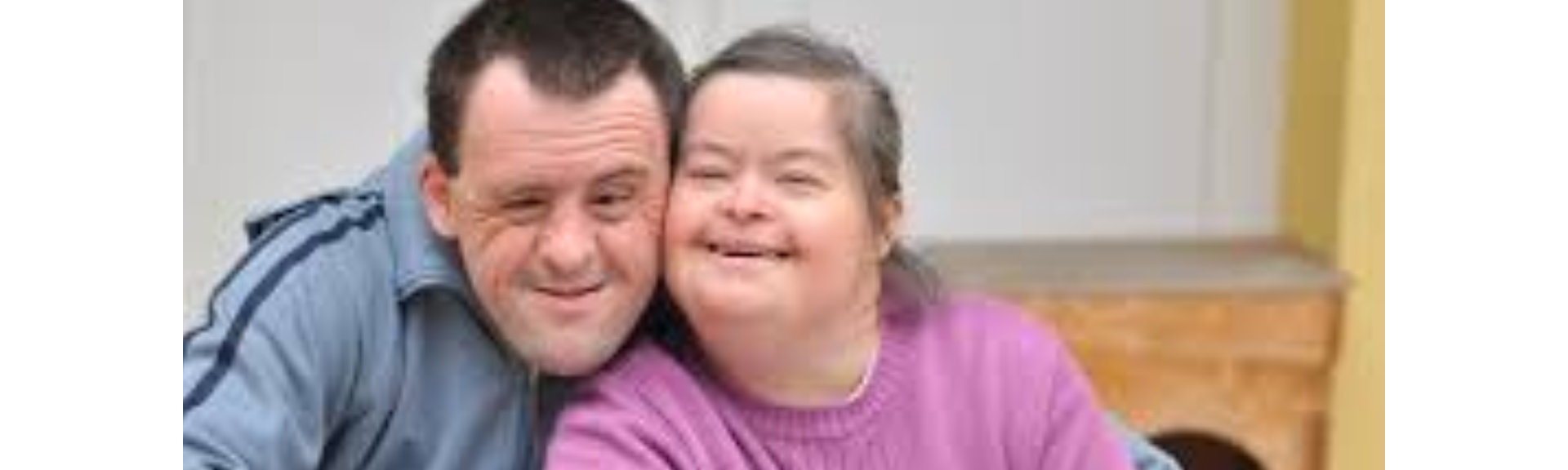 Portrait of two people with special needs